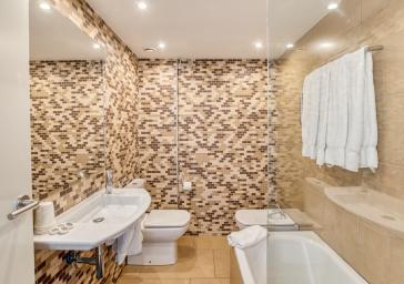 Habitació triple amb accés a l'spa