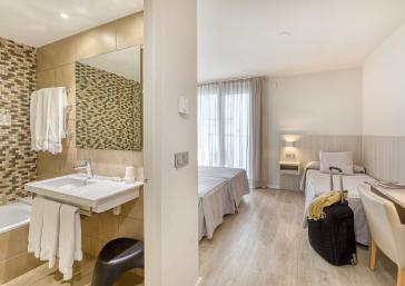 Habitació triple amb accés a l'spa