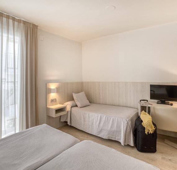 Dreibettzimmer mit Zugang zum Spa