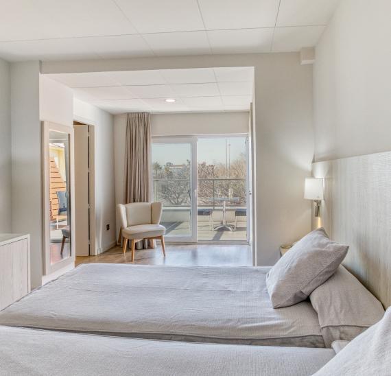 Doppelzimmer mit seitlichem Meerblick und Zugang zum Spa