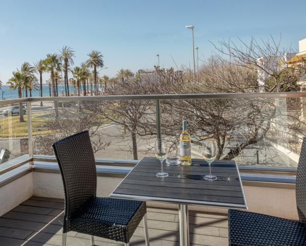 Habitació triple amb vistes laterals al mar amb accés a l'spa